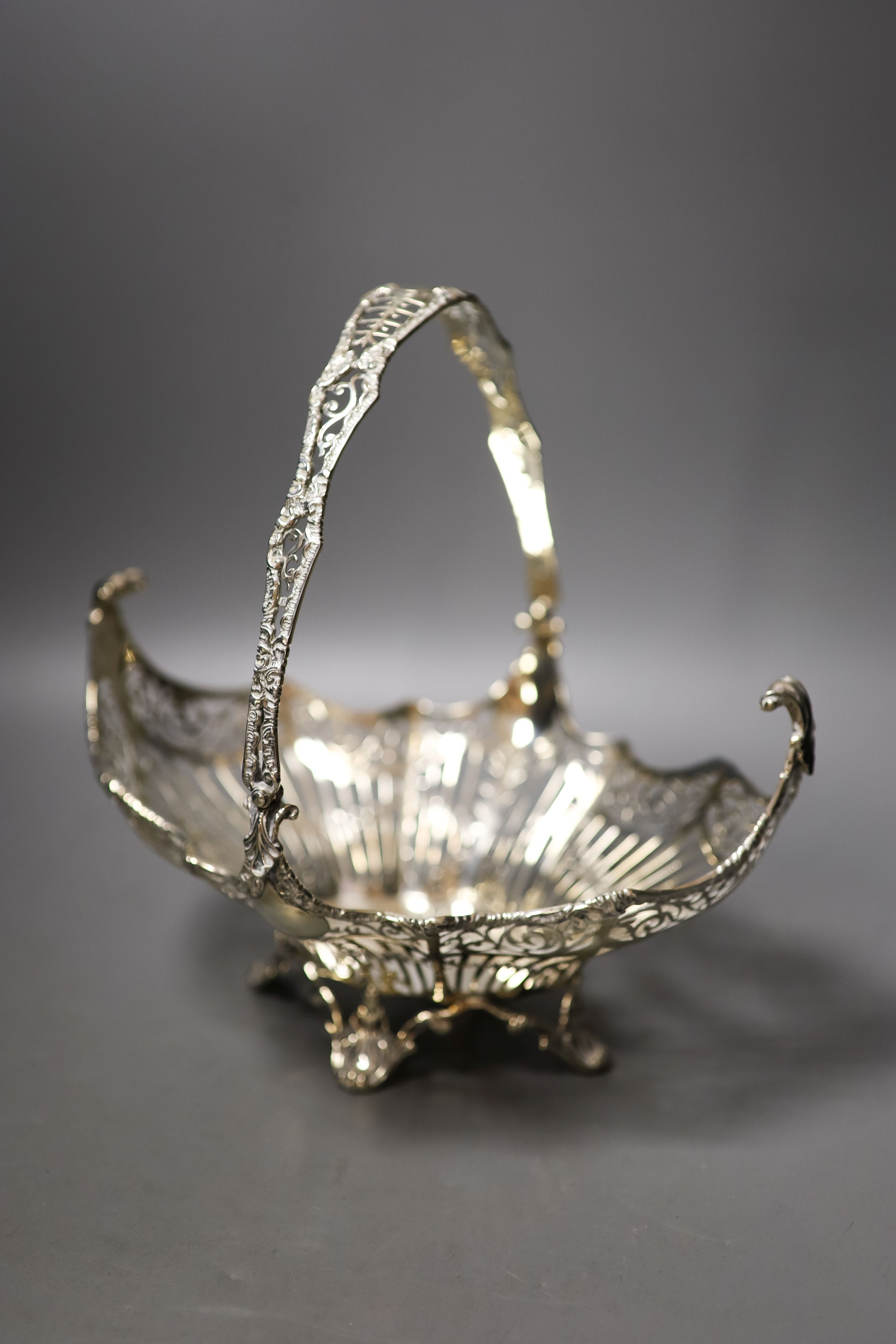 A George V pierced silver oval fruit basket, Josiah William & Co, London, 1920, length 25.5cm, 16oz.